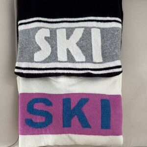 2 women’s SKI sweaters